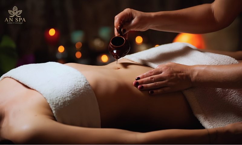 massage vùng bụng kết hợp tinh dầu